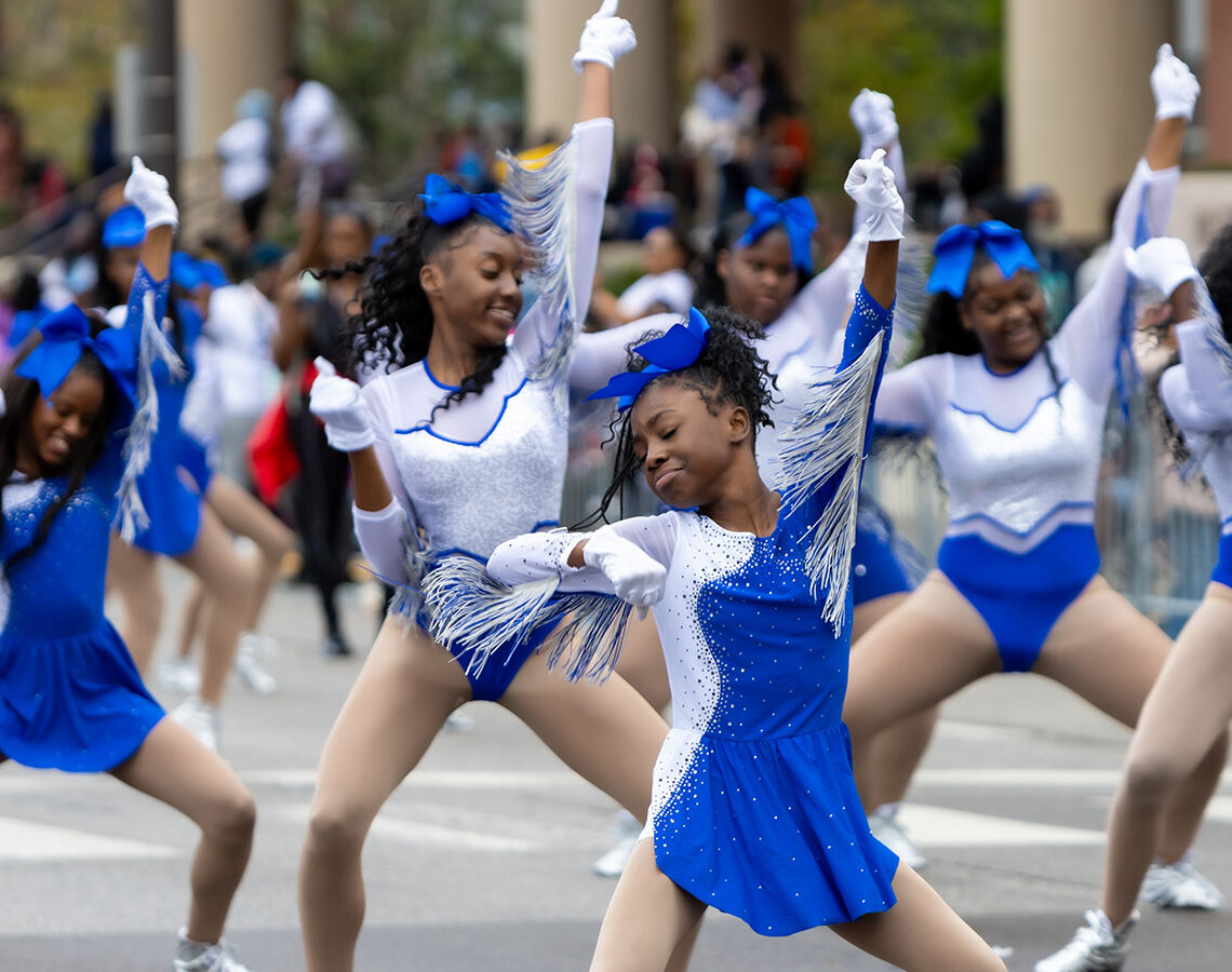 group of girls dancing at parade